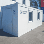 Kontorscontainer sk kontorsbod i grått med två fönster