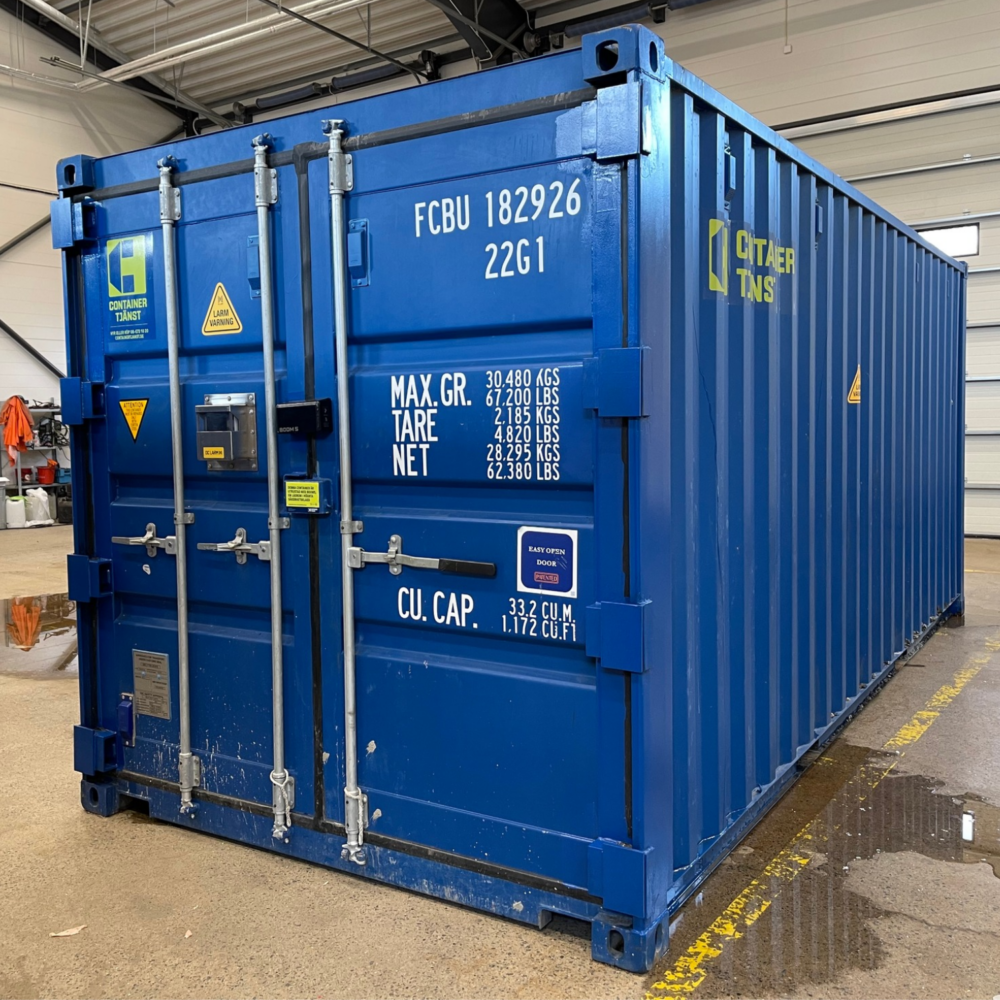 Containertjänst containerlarm monterat på en blå säkerhetscontainer